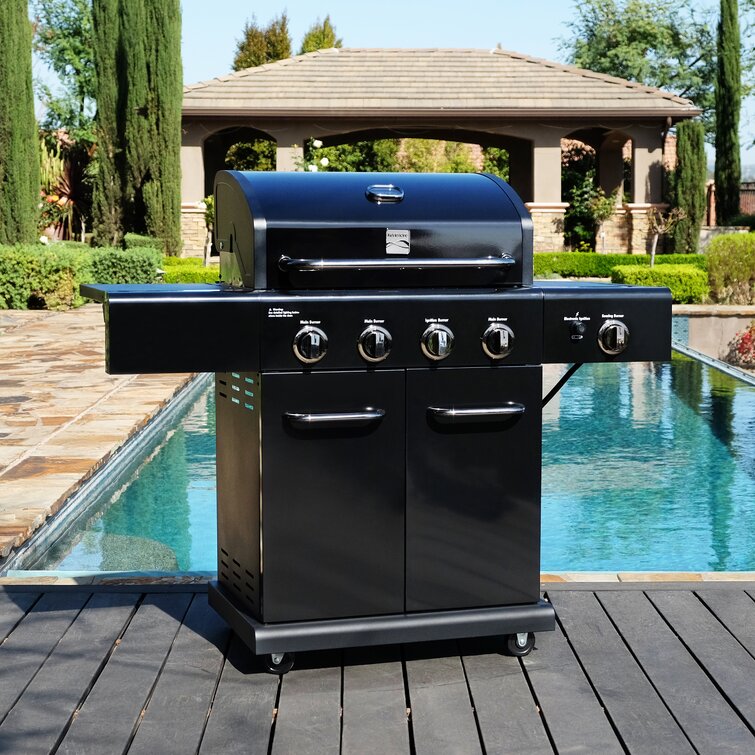 Propane gas grill with side clearance burner